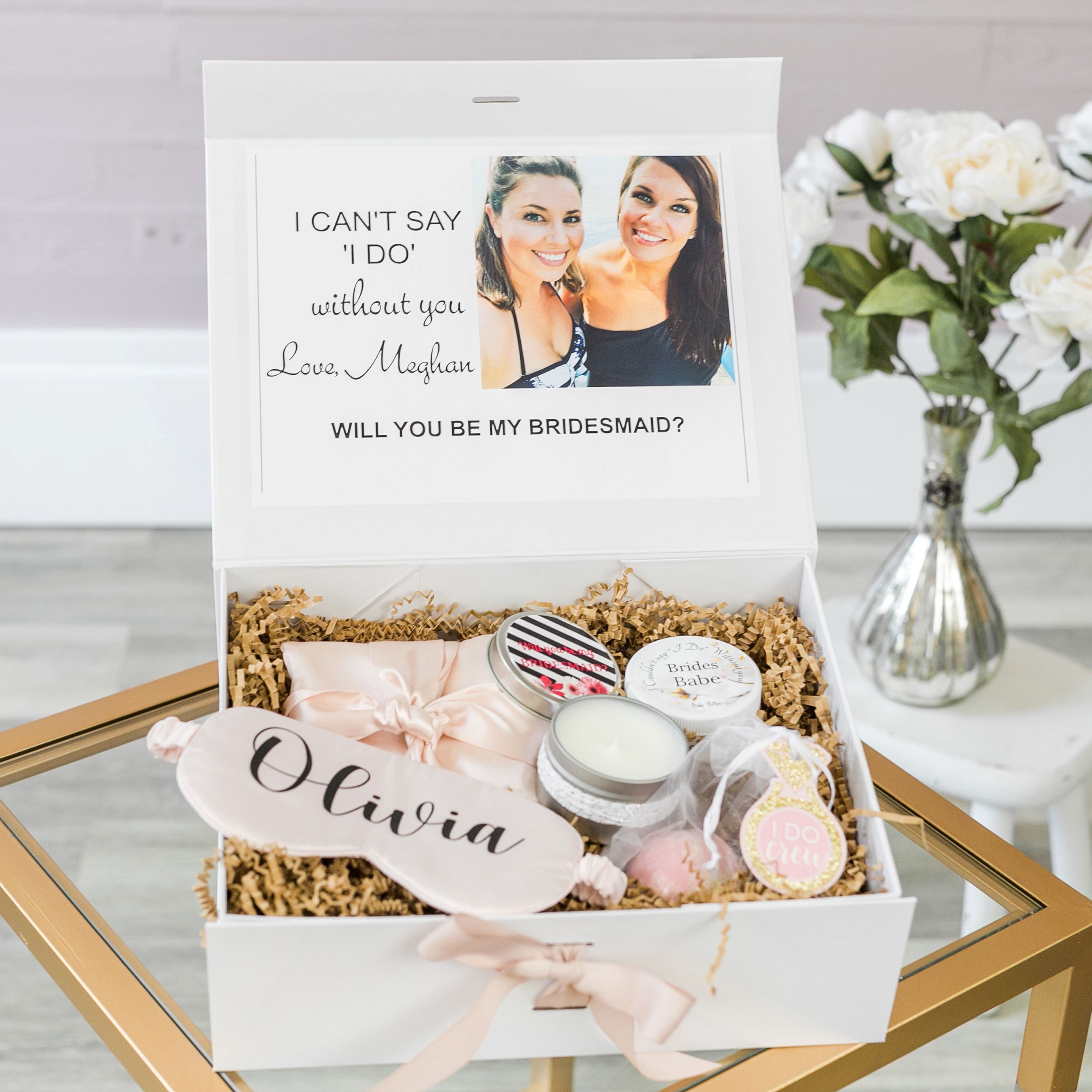 Build a bridesmaid photo box options include robe sleep mask spa
